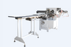 Semi-automatic brush packing machine for special shape of chocolates
